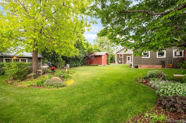 3317 Harlan St, Wheat Ridge, CO 80033 - view of green lawn featuring an outbuilding