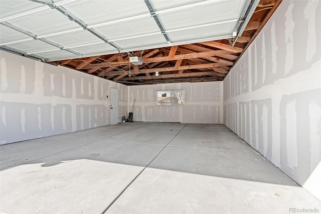 garage featuring a garage door opener