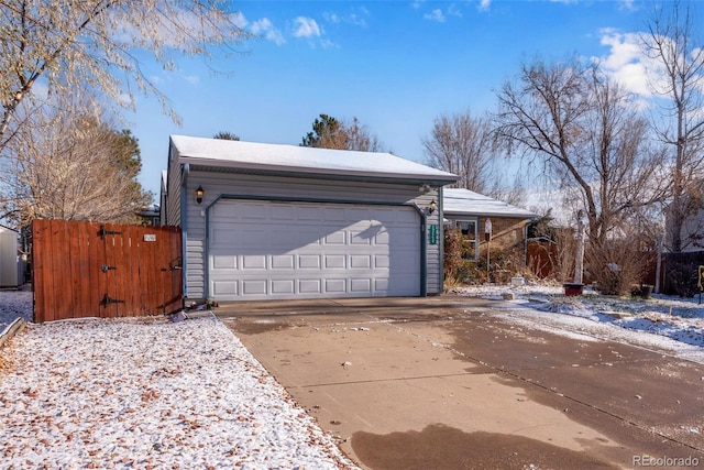 view of snow covered garage