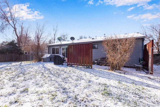 view of snow covered property