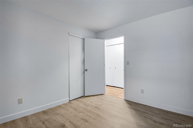 unfurnished bedroom with light hardwood / wood-style flooring