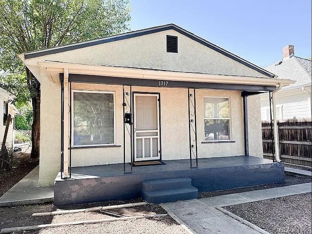1317 Bragdon Ave, Pueblo, CO 81004 - view of front of home featuring covered porch and stucco siding