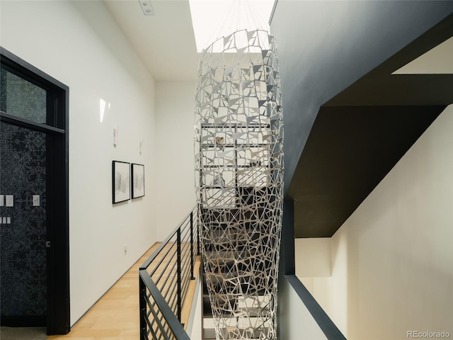 staircase featuring light hardwood / wood-style flooring