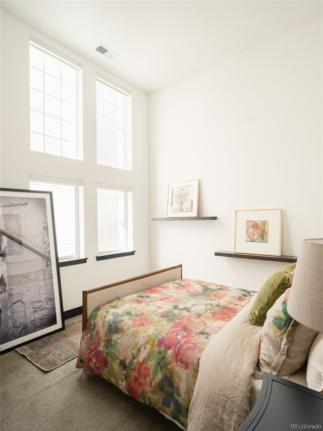 bedroom featuring carpet