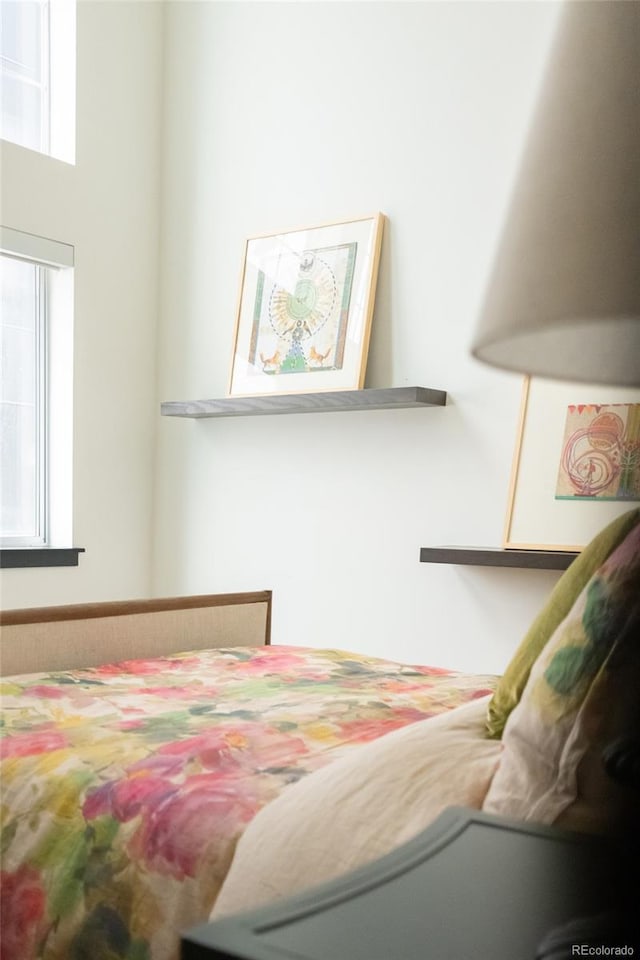 bedroom featuring multiple windows