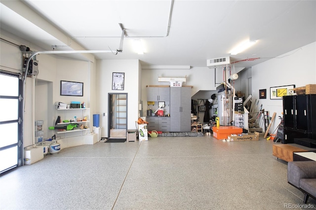 garage featuring water heater