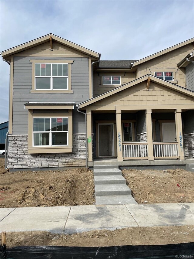 craftsman-style home featuring covered porch