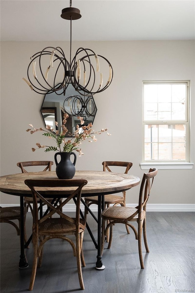 dining area featuring baseboards