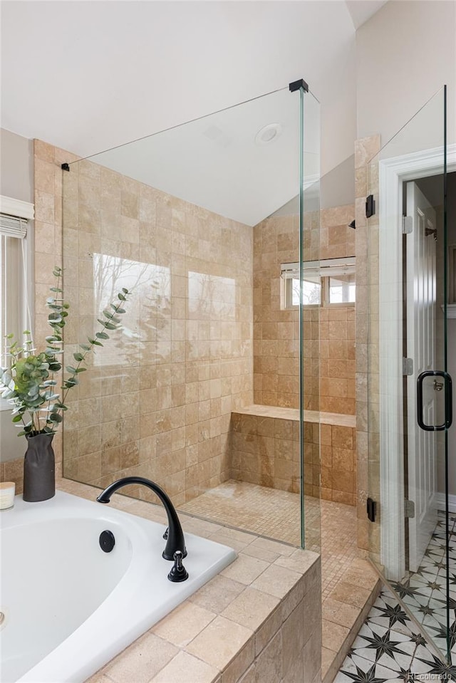 full bath with a garden tub, a stall shower, and lofted ceiling