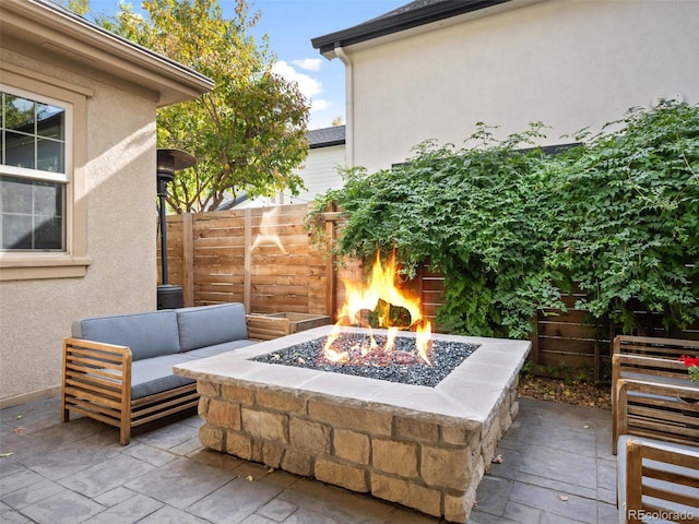 view of patio / terrace featuring fence