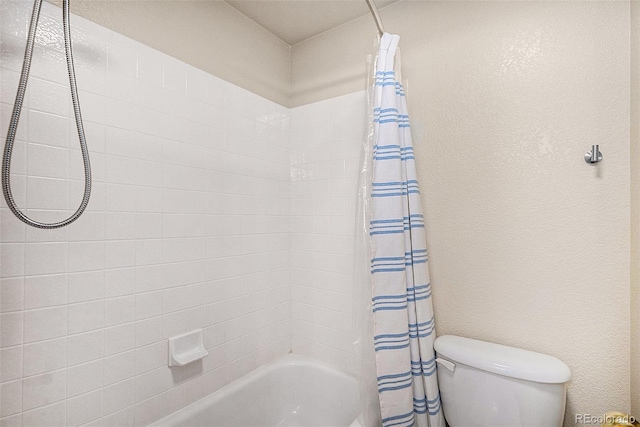 1325 Kingsfield St, Castle Rock, CO 80104 - bathroom with shower / bathtub combination with curtain and toilet