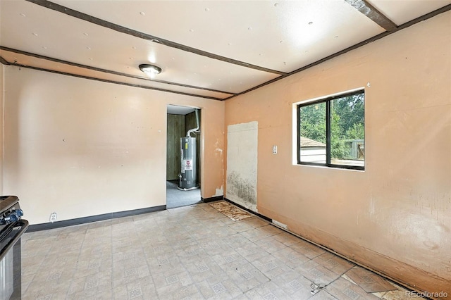 12 Marshall Pl, Longmont, CO 80504 - empty room featuring water heater and baseboards