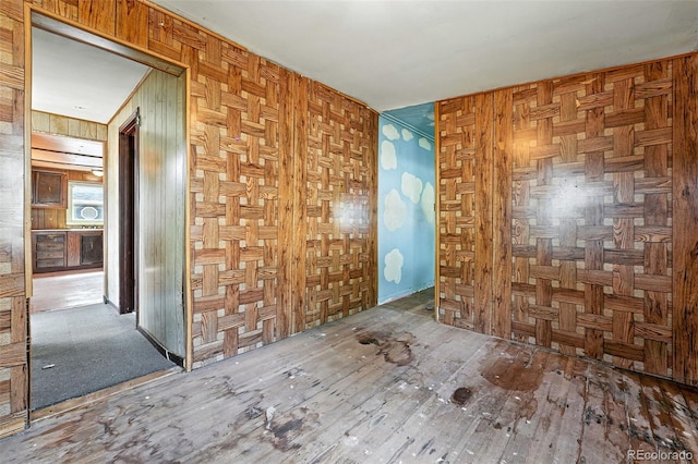 12 Marshall Pl, Longmont, CO 80504 - spare room with wood walls and wood finished floors