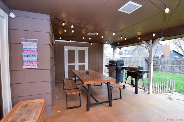 8229 Estes Ct, Arvada, CO 80005 - view of patio / terrace with area for grilling and outdoor dining area