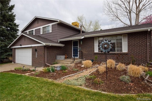 8229 Estes Ct, Arvada, CO 80005 - tri-level home with brick siding, driveway, and a chimney