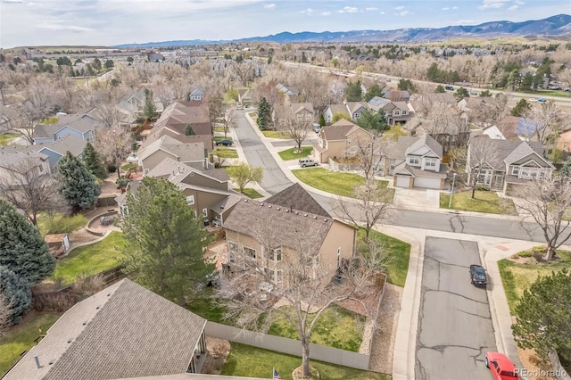 aerial view with a mountain view and a residential view