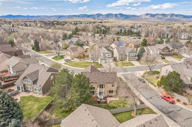 bird's eye view featuring a mountain view and a residential view