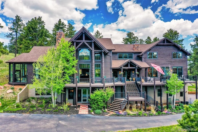221 Columbine Pl, Woodland Park, CO 80863 - view of property featuring stairs
