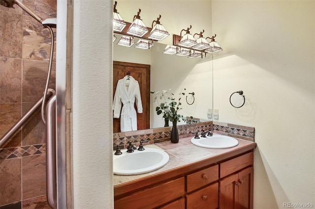 221 Columbine Pl, Woodland Park, CO 80863 - full bathroom with double vanity and a stall shower