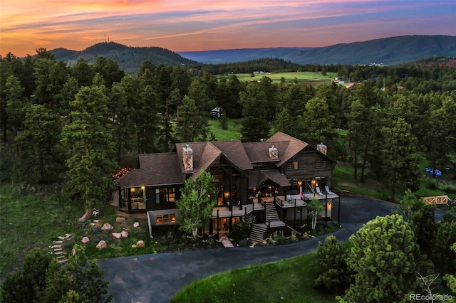 221 Columbine Pl, Woodland Park, CO 80863 - aerial overview of property's location with a mountain backdrop