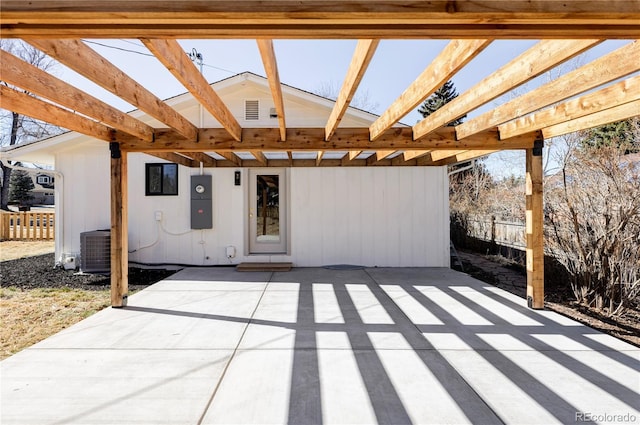 view of patio / terrace with central AC, fence, and a pergola