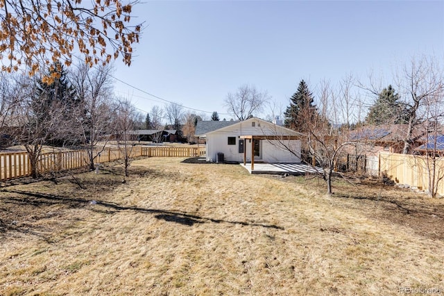 view of yard with a fenced backyard