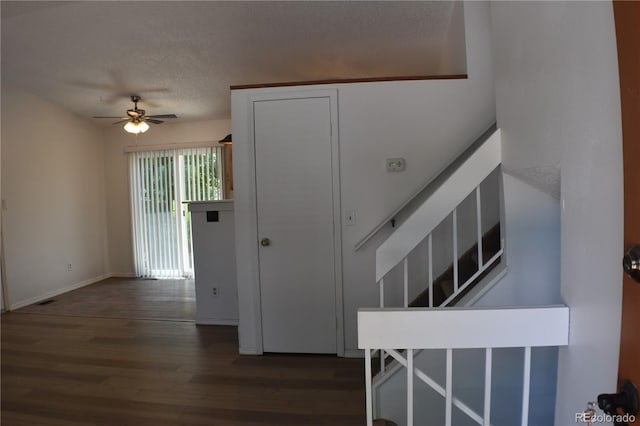 4585 Gatewood Dr, Colorado Springs, CO 80916 - interior space with wood finished floors, stairway, and a textured ceiling