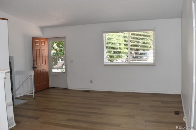 4585 Gatewood Dr, Colorado Springs, CO 80916 - entryway with wood finished floors and baseboards