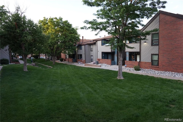 12033 E Harvard Ave Unit 208, Aurora, CO 80014 - view of community with a yard
