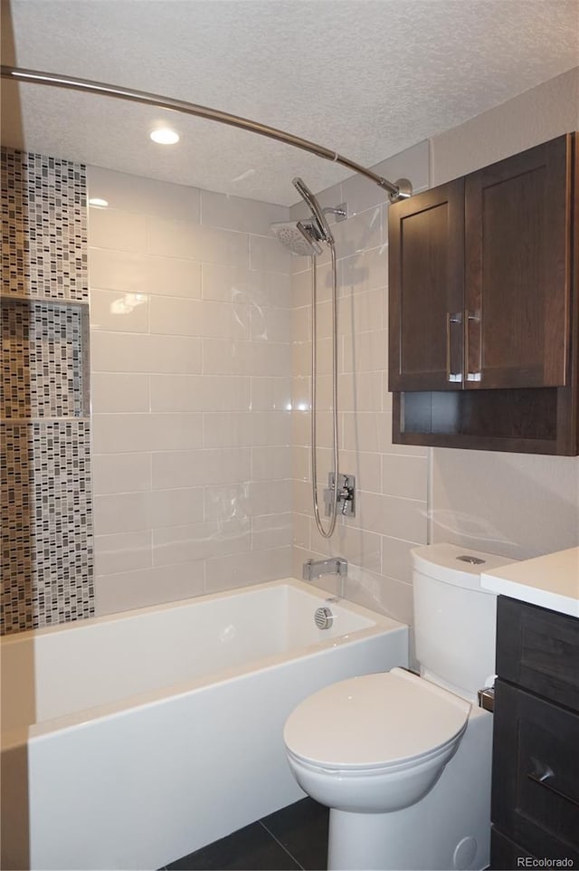 12033 E Harvard Ave Unit 208, Aurora, CO 80014 - full bath featuring a textured ceiling,  shower combination, vanity, recessed lighting, and tile patterned floors