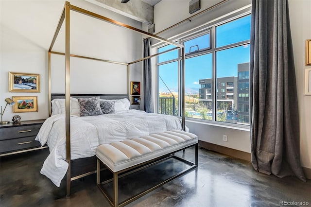 bedroom featuring a high ceiling