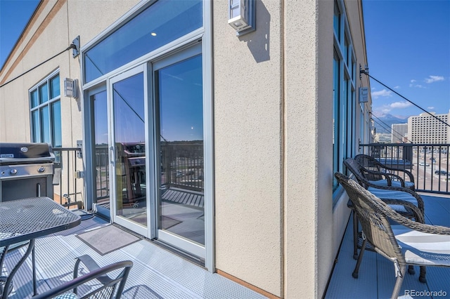 balcony featuring a grill