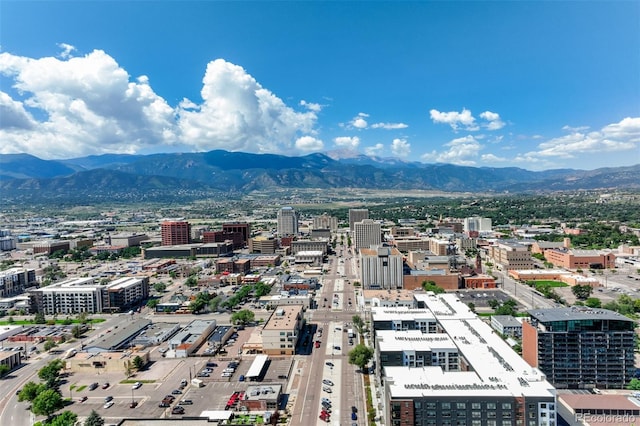 birds eye view of property featuring a mountain view