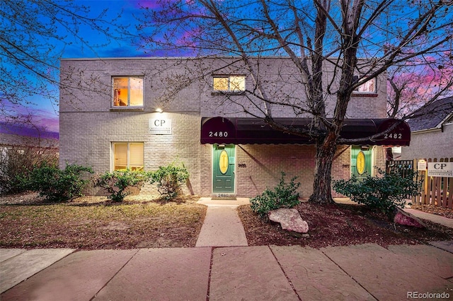 view of front of property with brick siding
