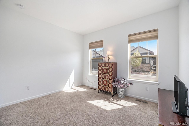 11791 Barrentine Loop, Parker, CO 80138 - living area featuring carpet flooring and baseboards