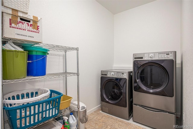11791 Barrentine Loop, Parker, CO 80138 - laundry area featuring washing machine and dryer and baseboards