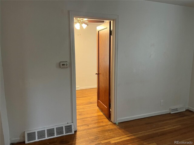 5899 Vance St, Arvada, CO 80003 - hallway with wood finished floors and baseboards