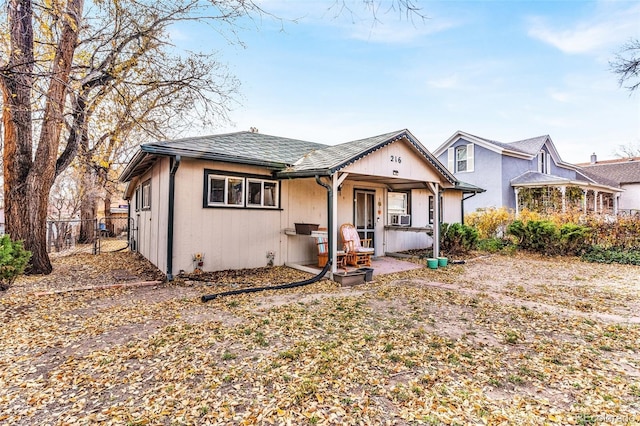 bungalow featuring cooling unit