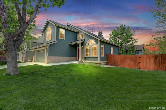 6735 W 97th Cir, Westminster, CO 80021 - traditional-style home featuring a garage and concrete driveway