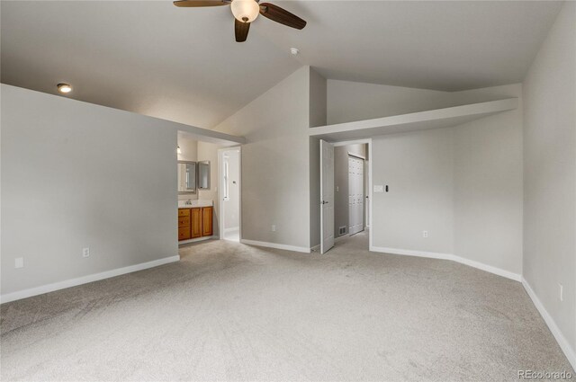 6735 W 97th Cir, Westminster, CO 80021 - spare room with light carpet, ceiling fan, baseboards, and high vaulted ceiling