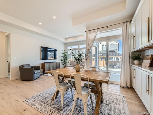 dining room with light wood-type flooring