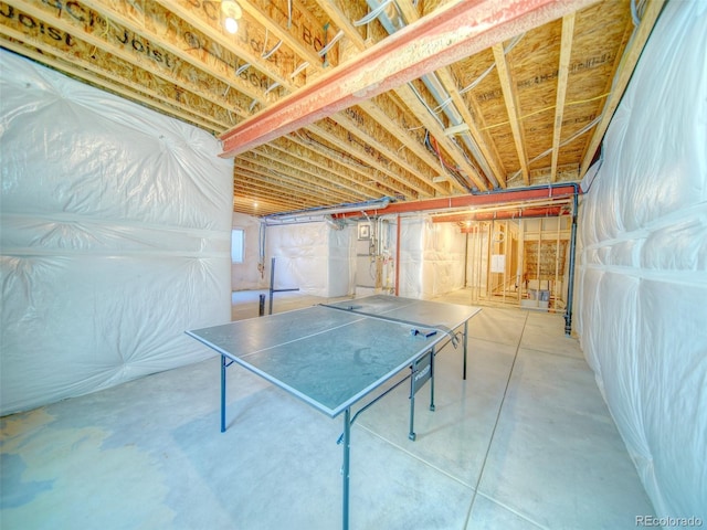 game room featuring concrete floors