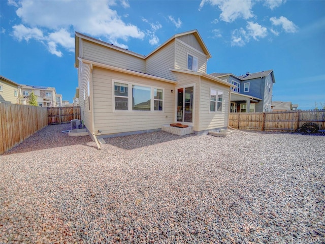 back of property with a patio area