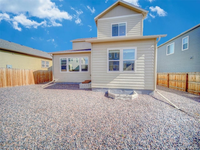 back of house featuring a patio area