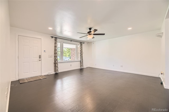 10633 E 6th Pl, Aurora, CO 80010 - spare room featuring ceiling fan, baseboards, recessed lighting, and dark wood-style floors