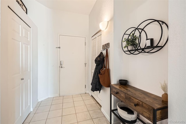 interior space with light tile patterned floors