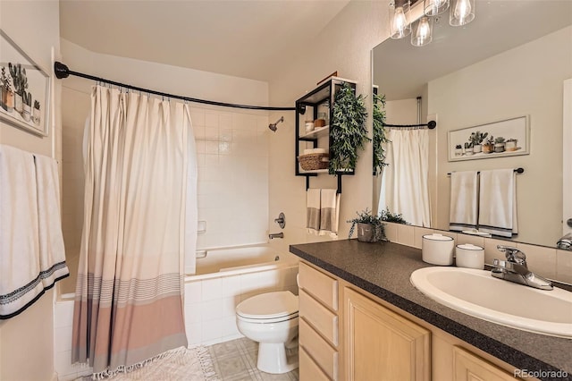 bathroom featuring vanity, shower / bathtub combination with curtain, tile patterned flooring, and toilet