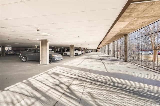 parking garage featuring fence