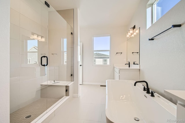 bathroom with tile patterned flooring, vanity, and plus walk in shower