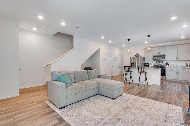 living room featuring light hardwood / wood-style floors